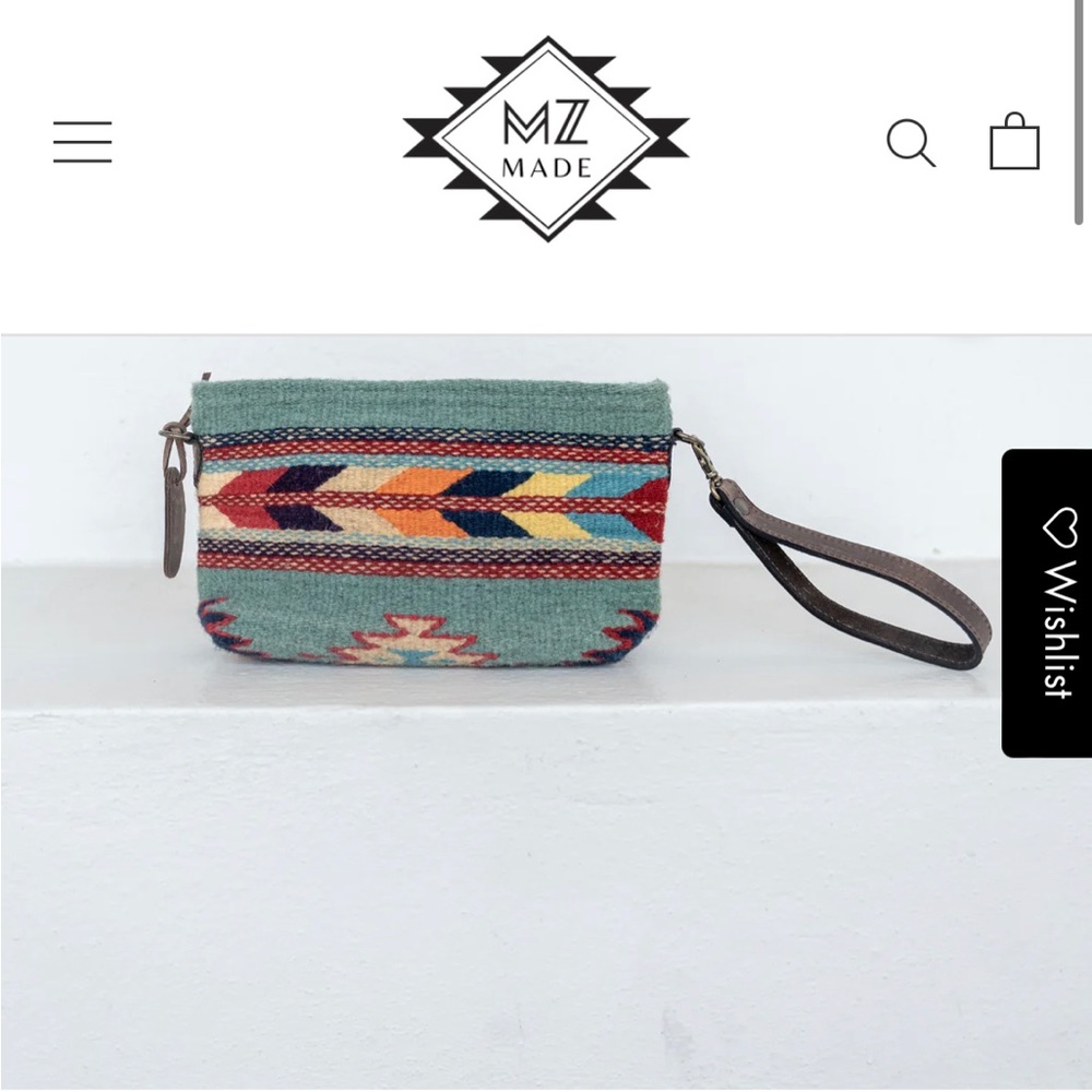MZ Fairtrade Sun+Sea convertible clutch. Brand new never used!